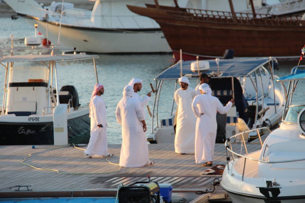Arab men showing their yachts, Abu Dhabi