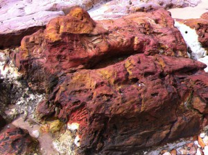 A red stone on Betka Beach, Mallacoota