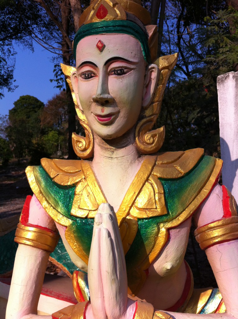 Wooden statue in the main village of Ko Samet, Thailand