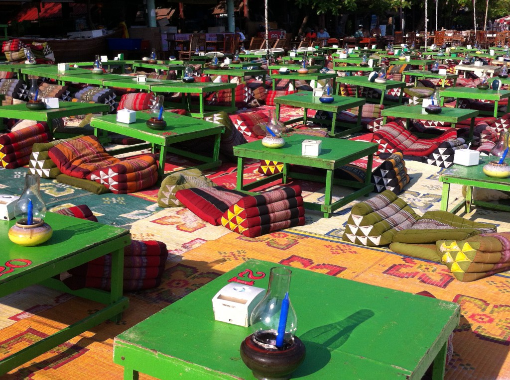 Beach tables waiting for customers to be seated