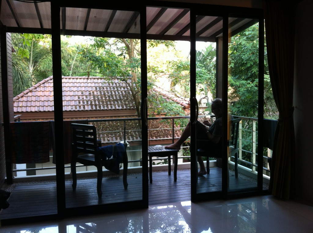 Working on the shady hotel balcony, Ko Samet