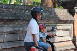 Drive in Central Bali, father and son