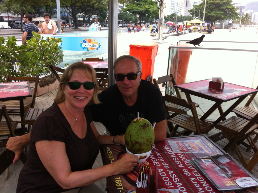Drinking coconut milk at a Copacabana cafe