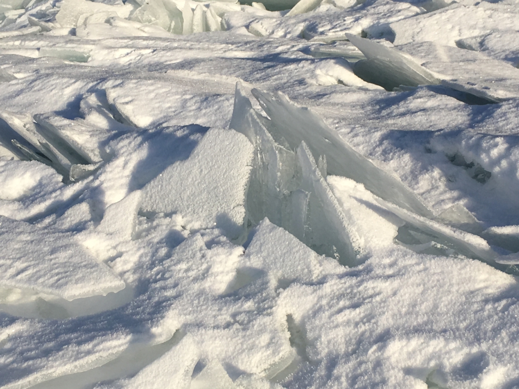 Packed ice on the frozen lake