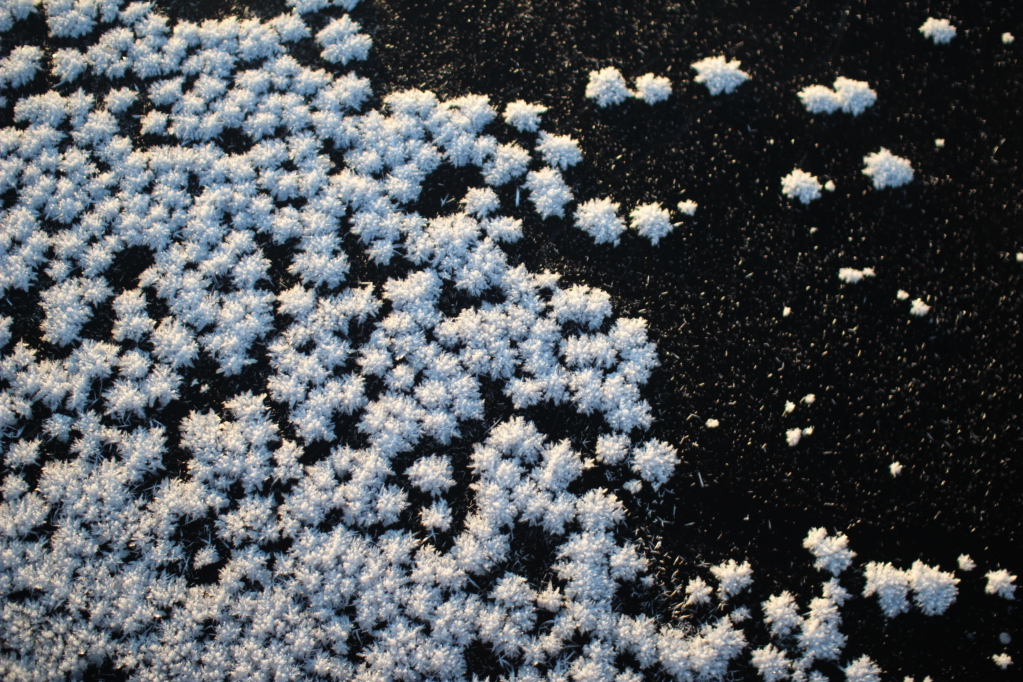 Winter in Finland, frozen lake and ice flowers
