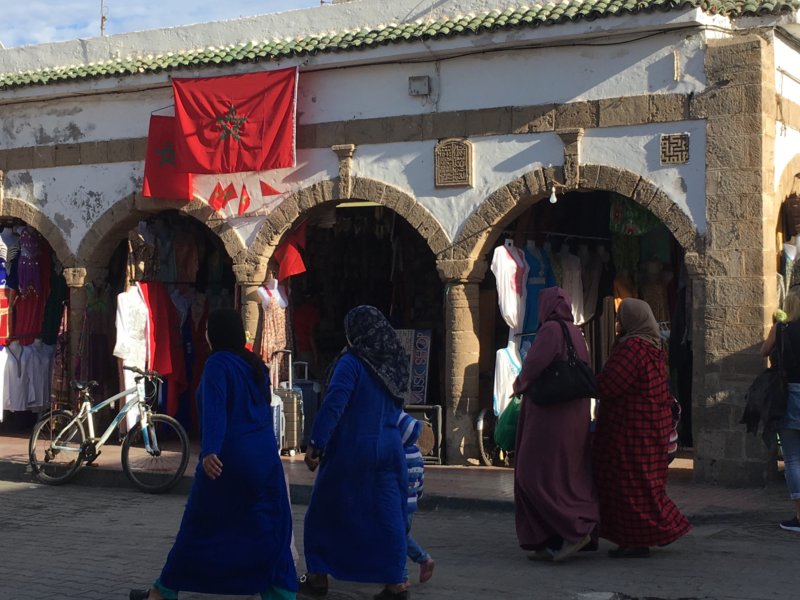 Ladies on Friday walk Essaouira souk, Morocco