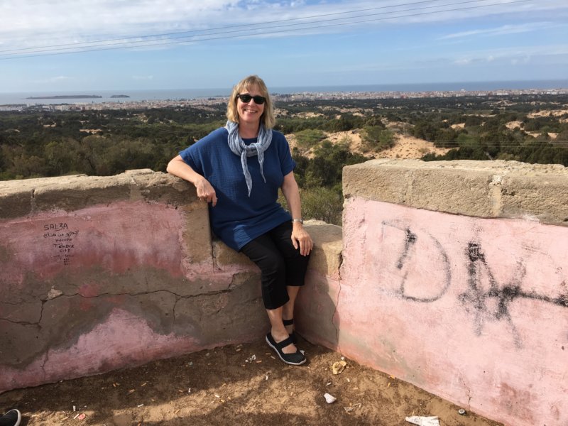 Travel blogger on Essaouira hills Visiting the historic Essaouira, Morocco