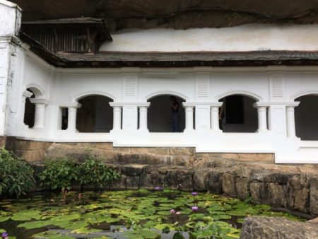 Dambulla Cave Temple and lotus pool