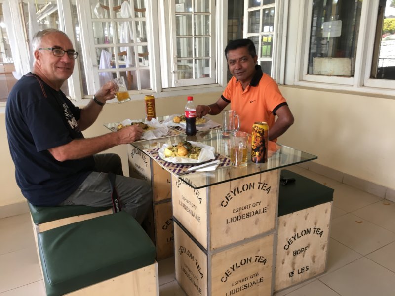 Tea factory lunch, sitting on tea boxes