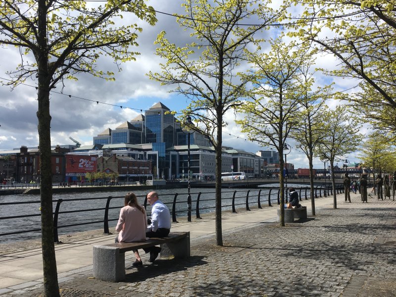 Sitting on Liffey river bank, Dublin