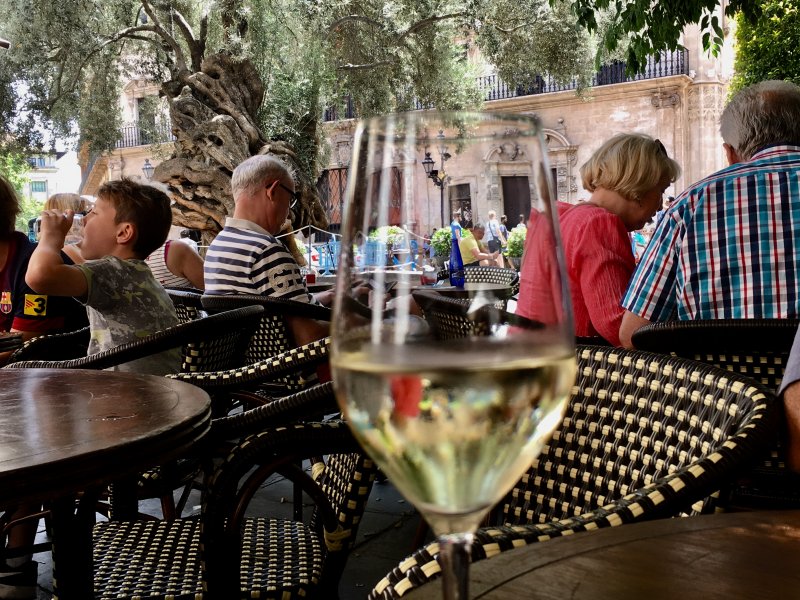 A glass of wine, Placa de Cort, Palma de Mallorca old town A glass of wine, Placa de Cort, Palma de Mallorca old town