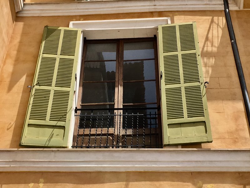 Green window shutters of Placa Major, Palma de Mallorca Green window shutters of Placa Major, Palma de Mallorca