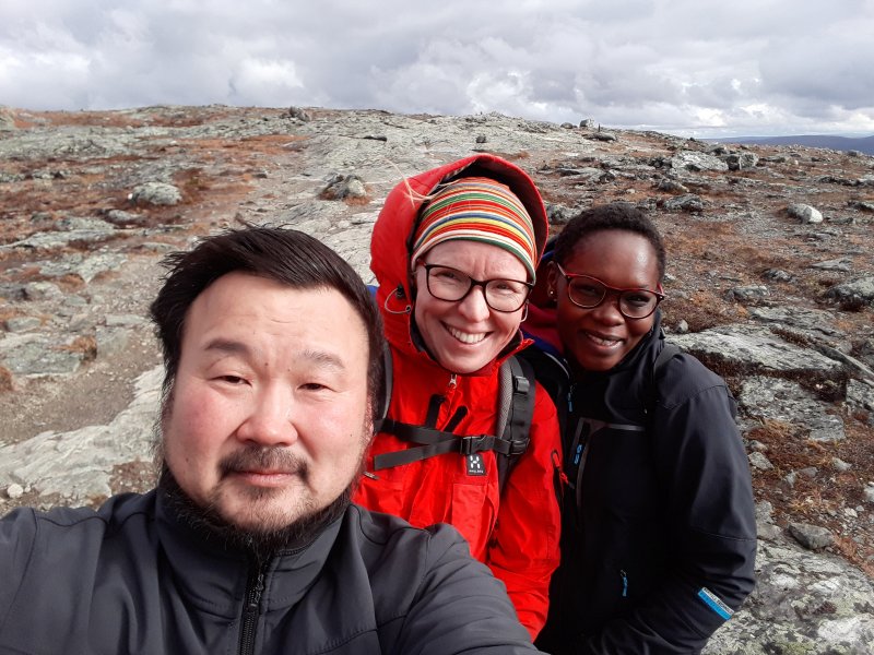Public health students and teacher on the top