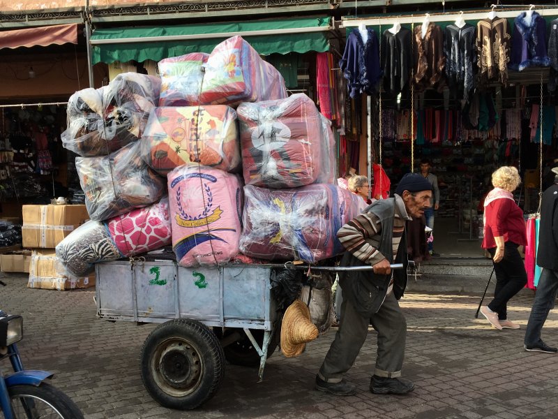 Man with a load in the souk, Marrakech