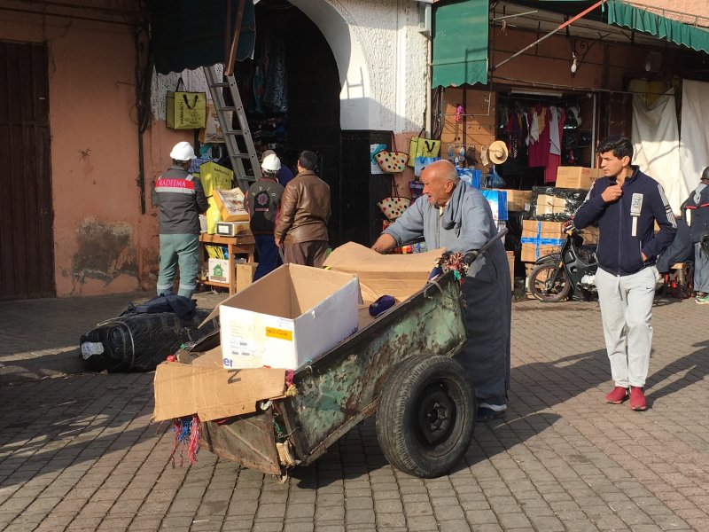 Man with his load Man with his load in the souks of Marrakech