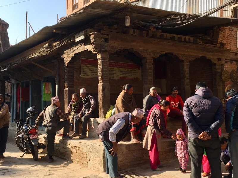 Nepal people: a family gathering on the square