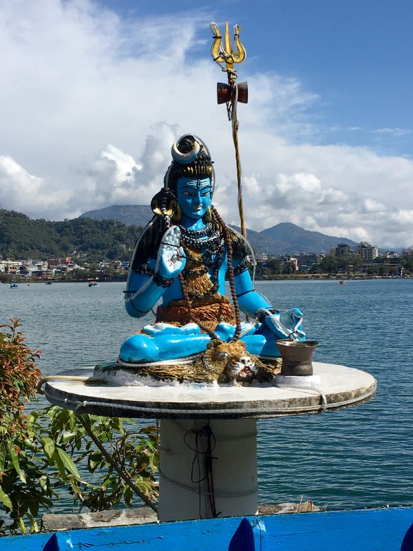 Blue statue behind Lake Phewa, Pokhara