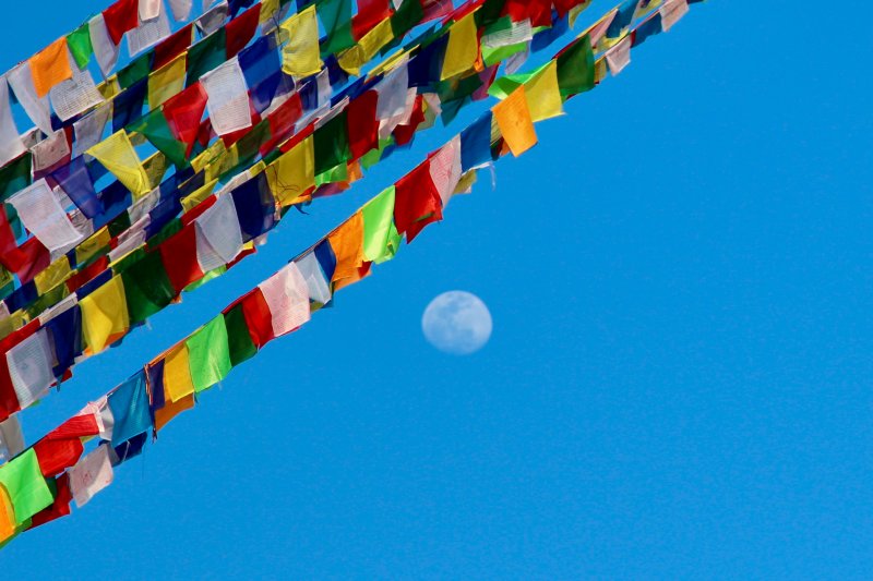 Prayer flags and full moon, Nepal Prayer flags and full moon, Nepal