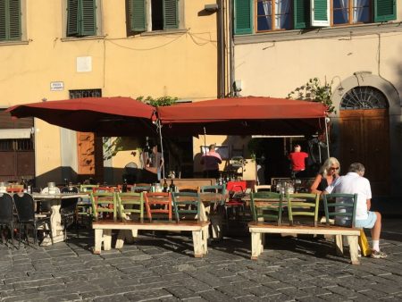 Italy by train and car: street cafe in Florence