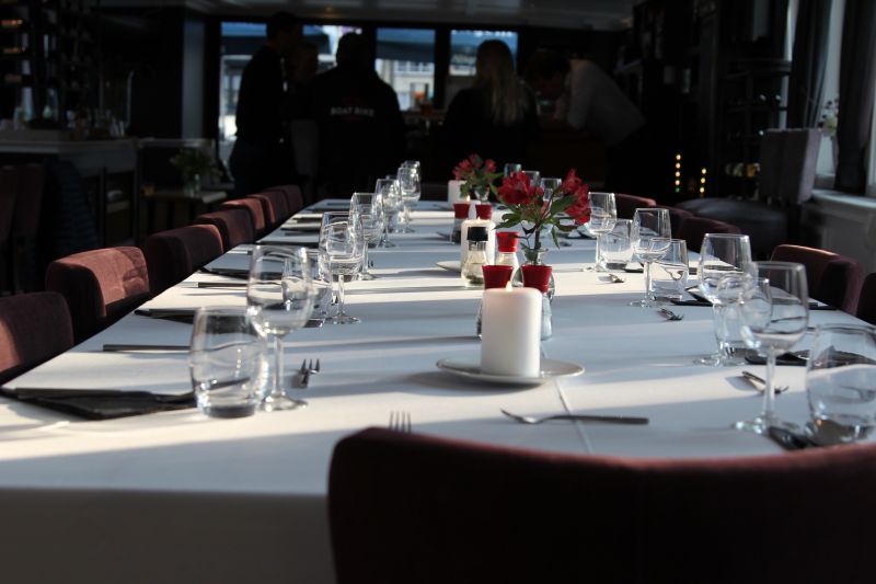 Dinner table made ready by the staff River cruising in Belgium and Netherlands: dinner table
