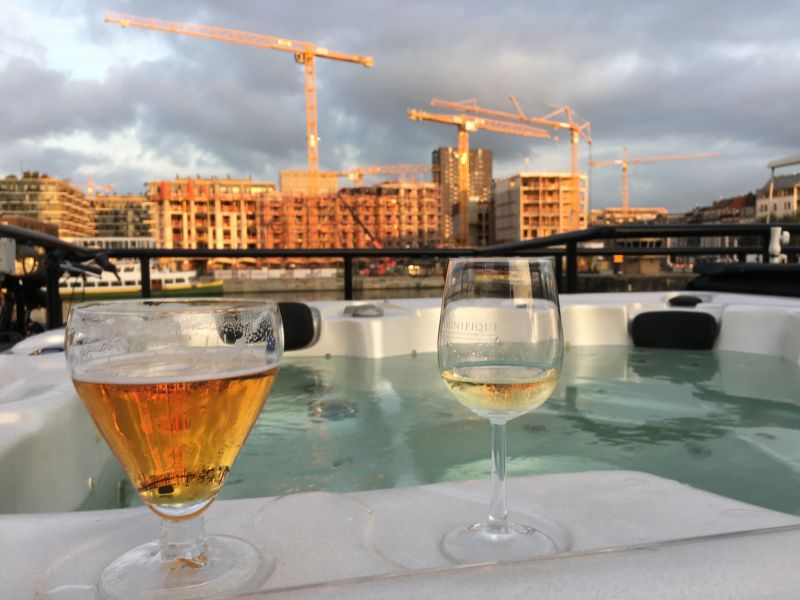 Antwerp seen from ship deck jacuzzi River cruising through Belgium and the Netherlands: jacuzzi, beer and wine