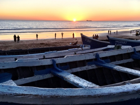 Taghazout, people on the beach at sunset