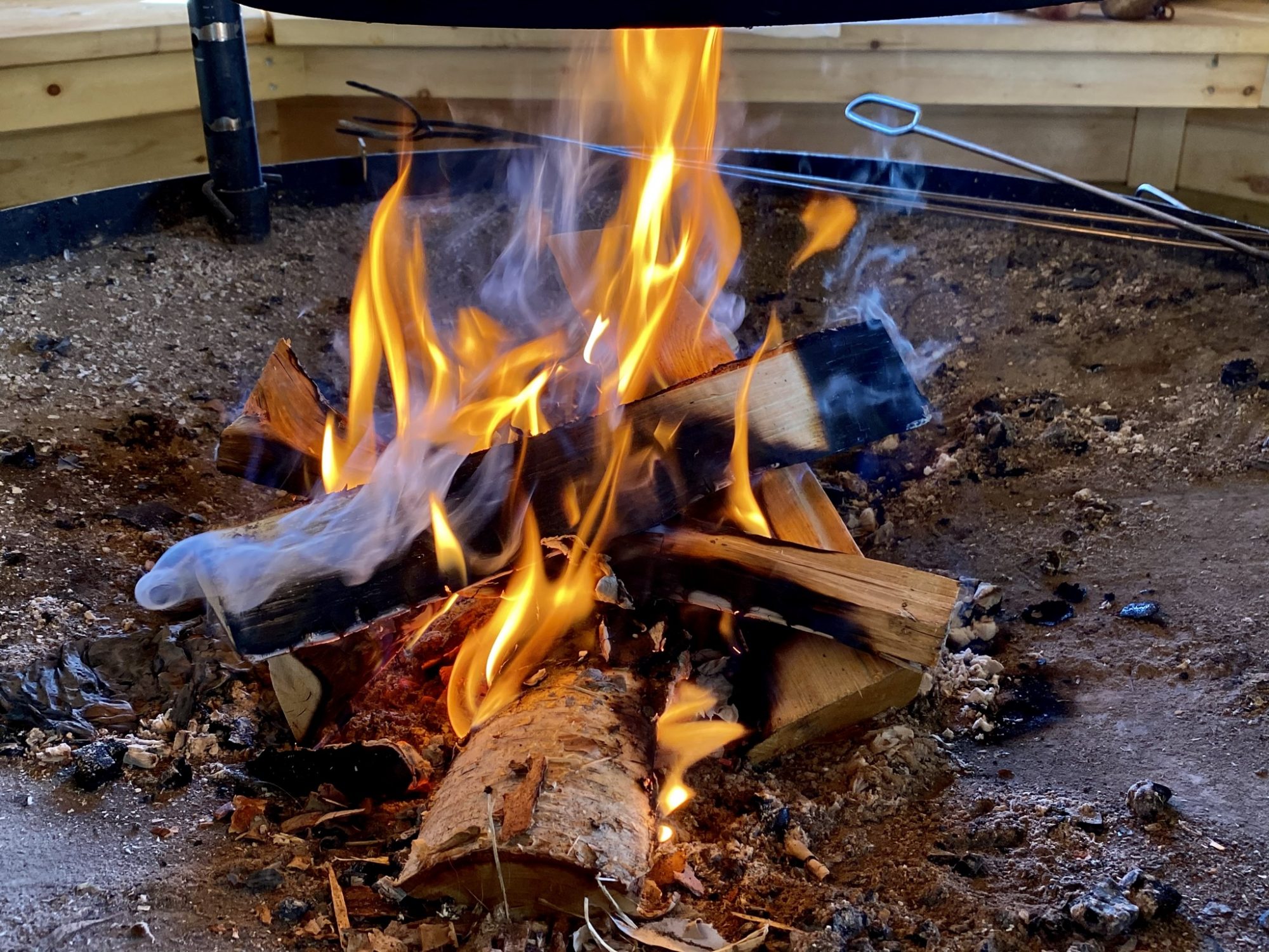 Campfire in a Lappish hut Arctic Lapland spring: campfire in a wilderness hut
