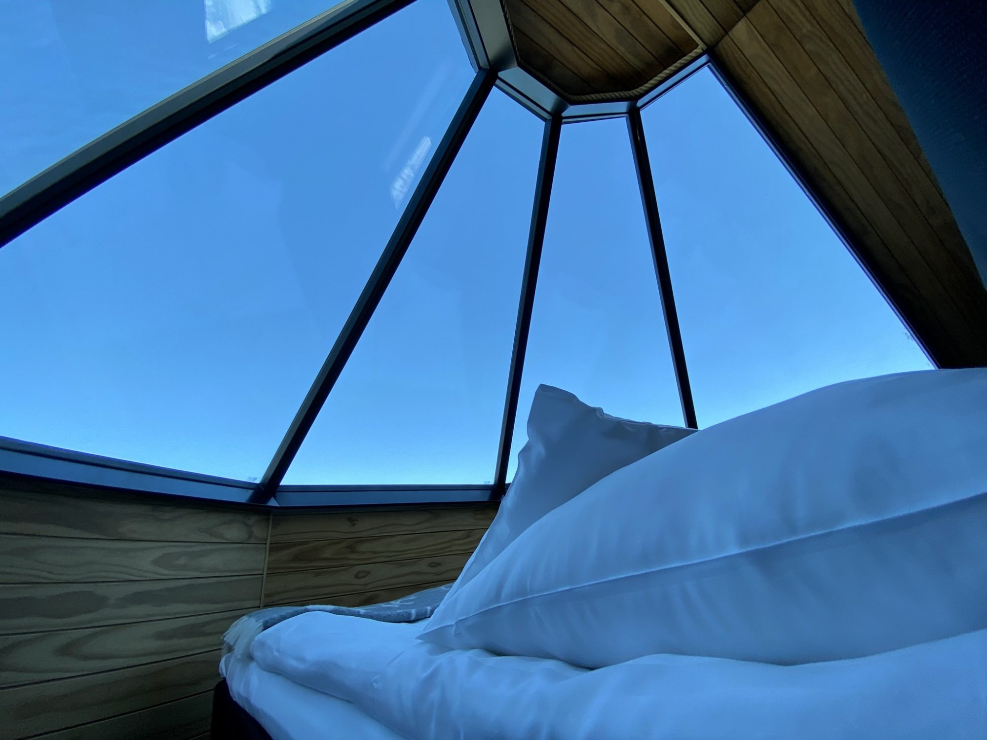 A glass roof for aurora watching Levi Northern Lights Village, Lapland