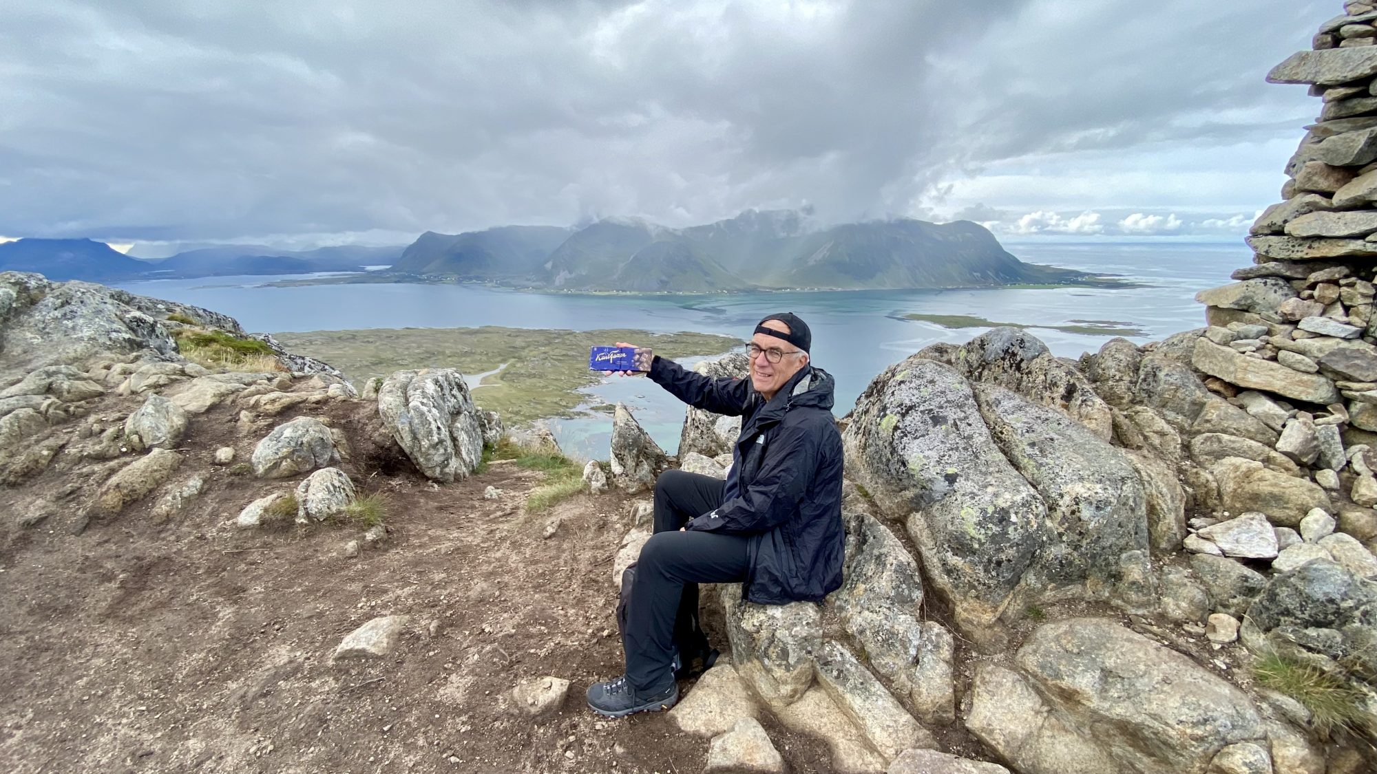 Chocolate break on the top Power from chocolate, Lofoten hikes