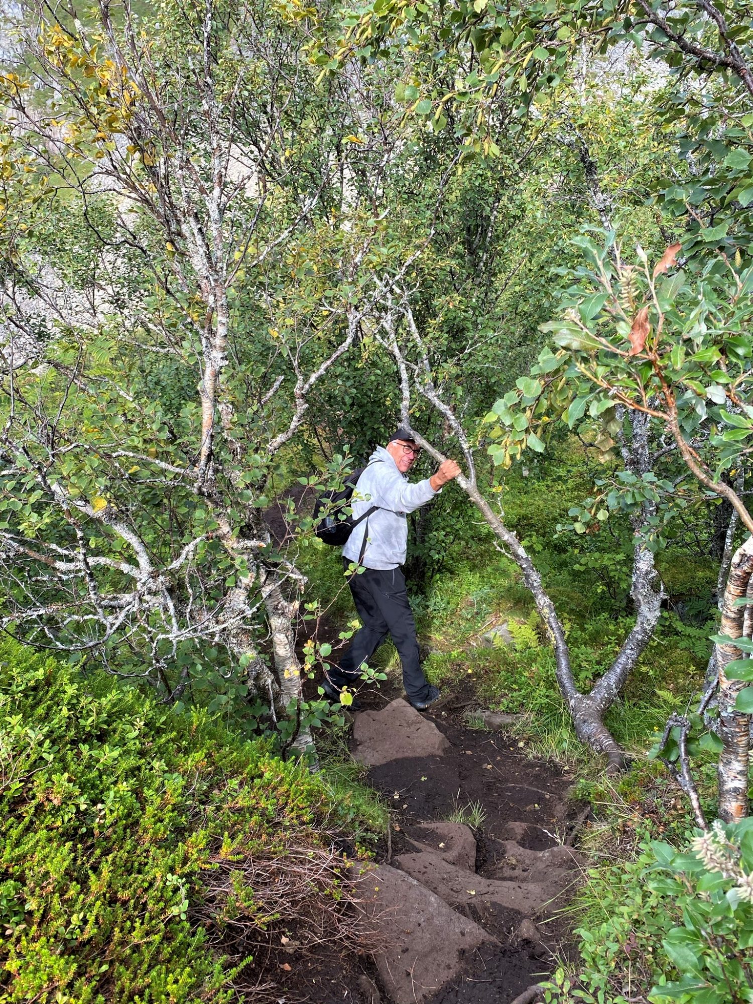 Walking down a muddy path Hiking a muddy Lofoten trail