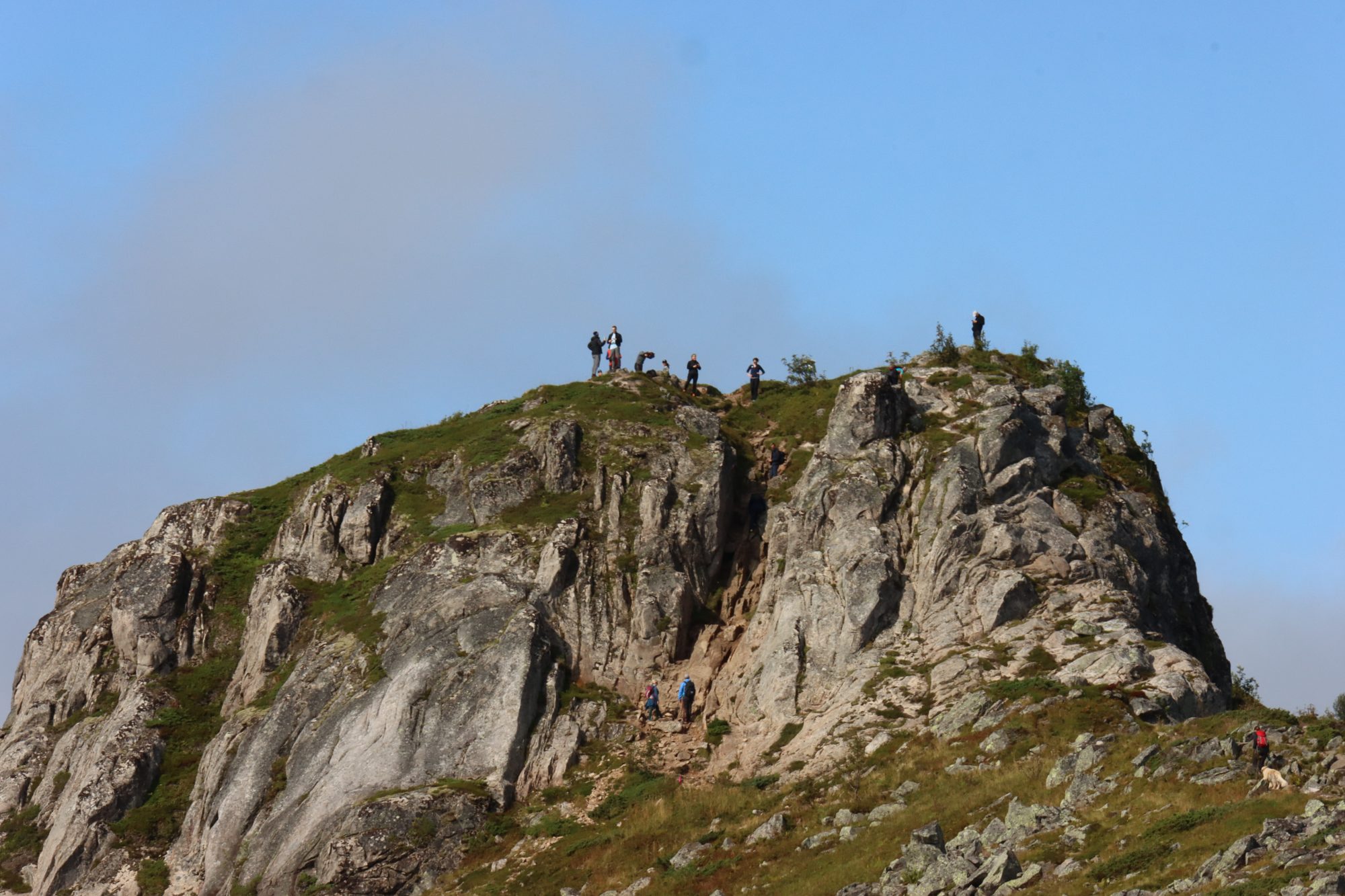 On the summit of Tjeldbergtinden Lofoten hikes: the top of Tjeldbergtinden